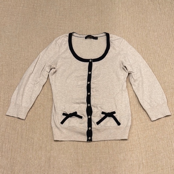 The Limited Sweaters - Cream Cardigan with Black Trim‎ and Bow Accents